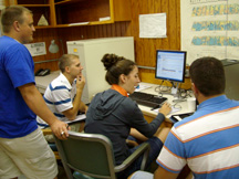 Rob Holsinger and team members work on simulation